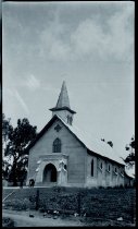 Fathers Celestine Holzem, SS.CC., and Theodose Herkenrath, SS.CC., in front of Saint Joseph Church, Makawao, Maui.